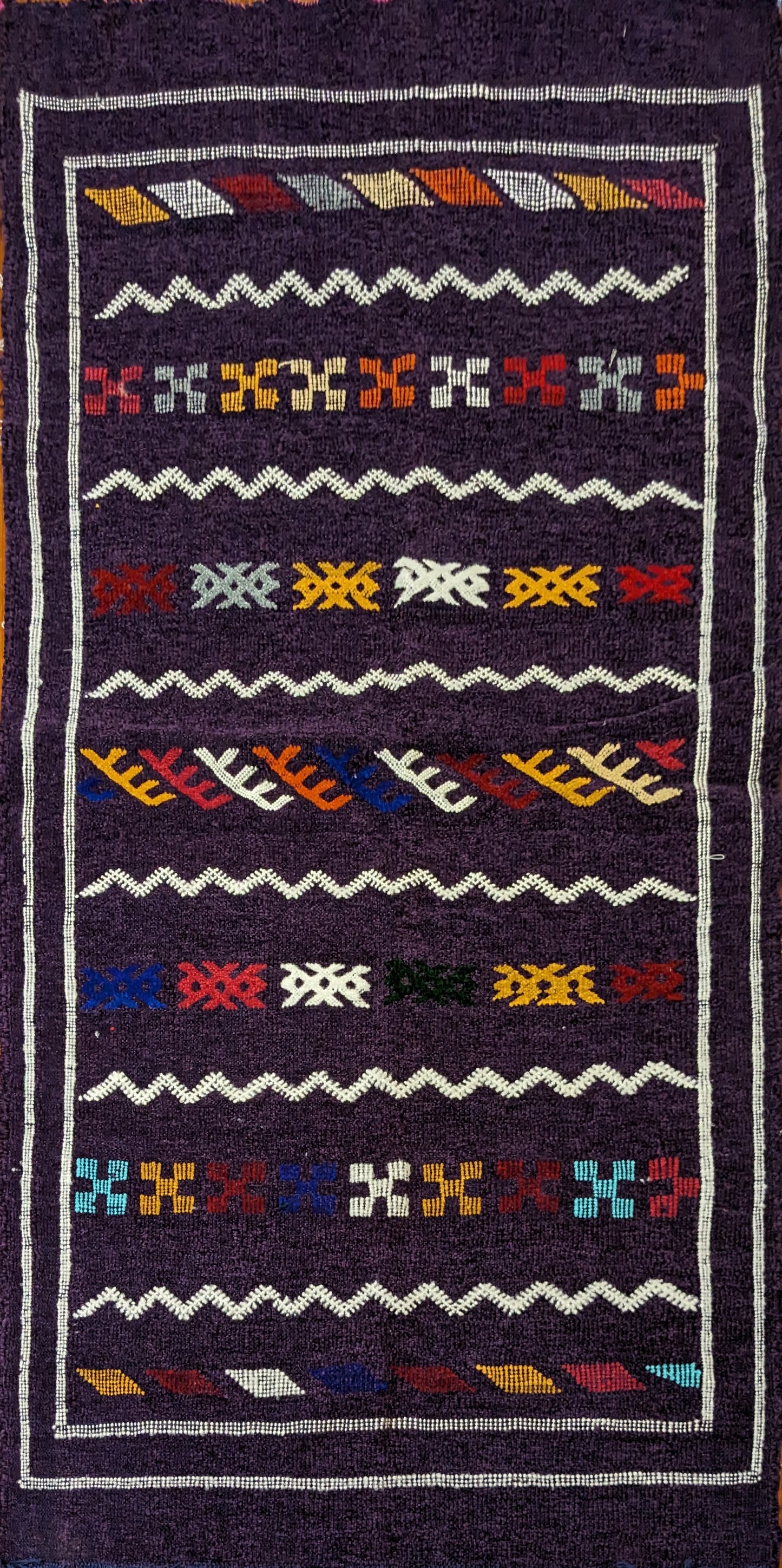 A Purple Rug with Berber Patterns